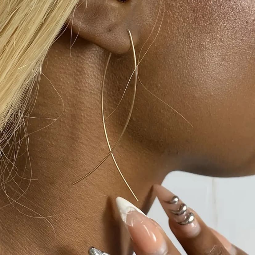 European and American Cross-border Explosions Fashion Simple Abstract Art Fishing Line Cross Earrings Metal Flow Design Sense Earrings